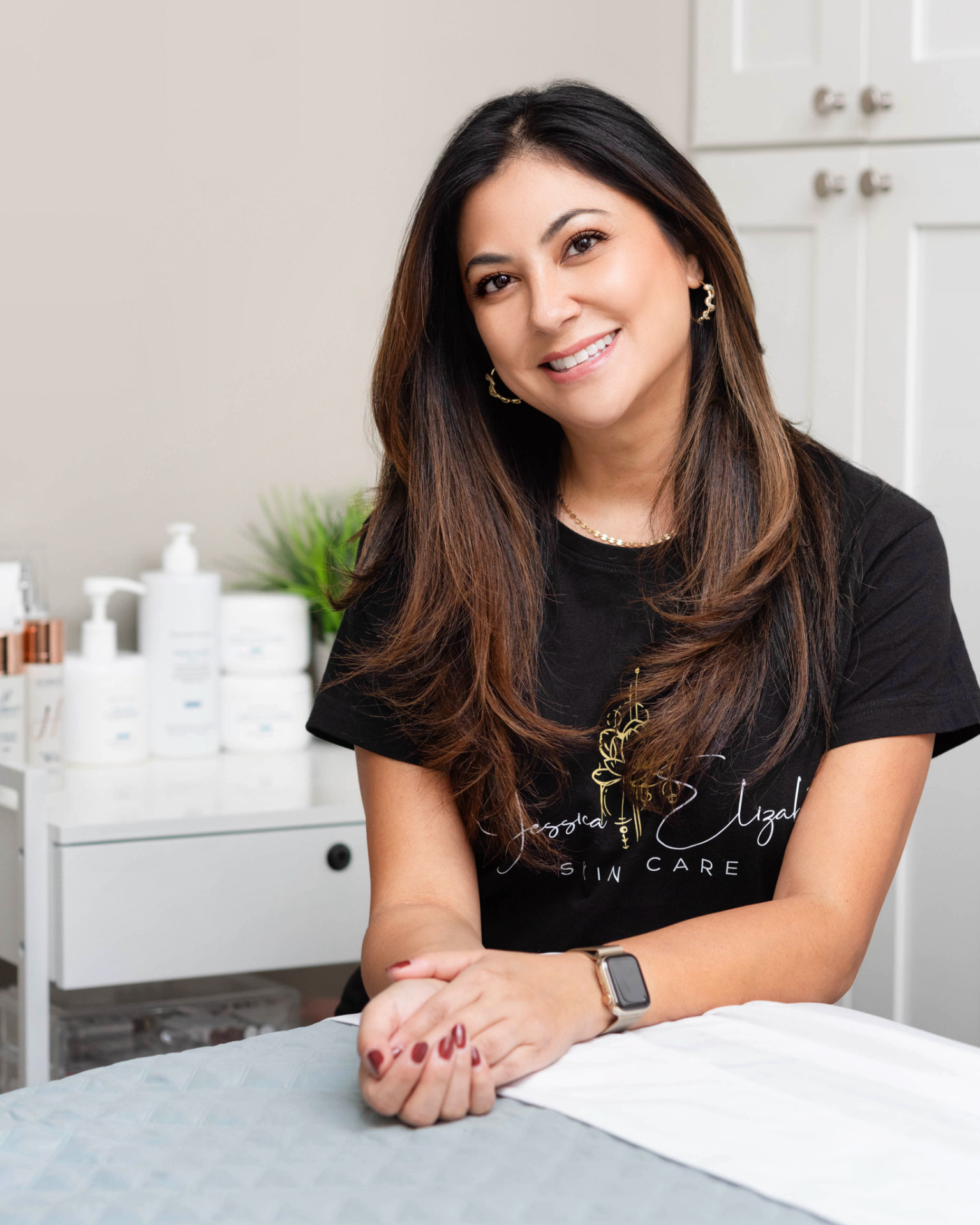 Jessica Elizabeth, licensed esthetician, in her Syracuse treatment room